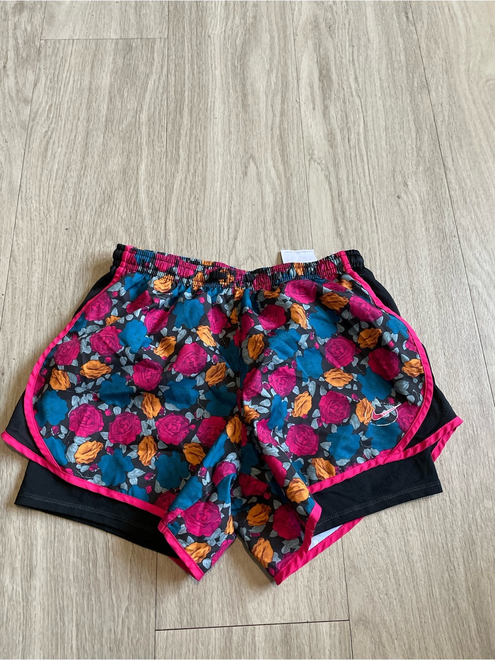 Nike Girls Floral Athletic Shorts in Pink, Teal, Orange